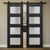 Nova 4-Lite Braga Blu Matrix Laminated Modern Double Barn Door - Doors and Beyond